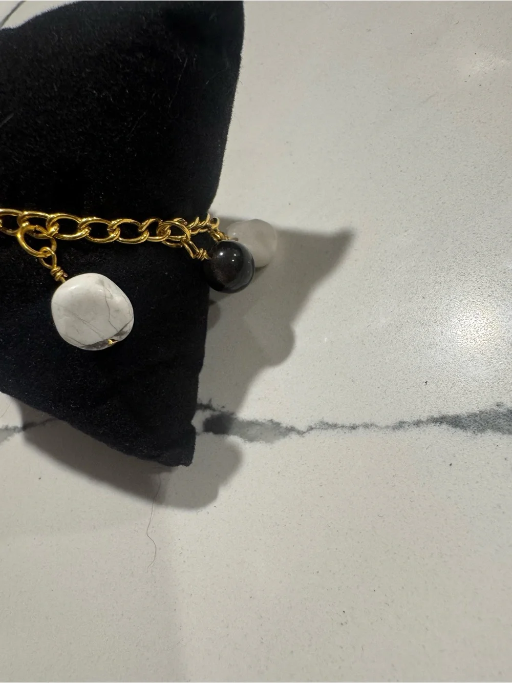 Handcrafted Gold Chain Charm Bracelet with White and Black Stone Drops